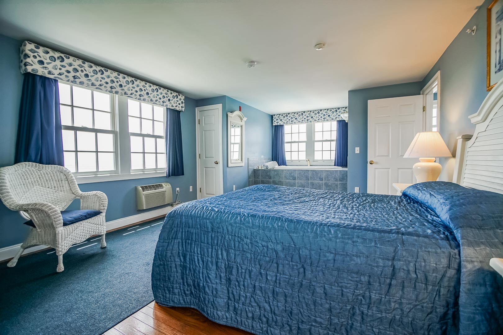 A spacious bedroom at VRI's Beachside Village Resort in Massachusetts.